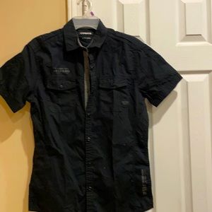 Black kids shirt has little gray